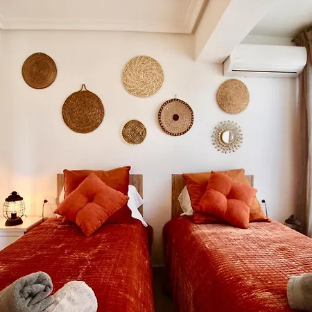 Апартаменти Palmeras Puerto En
